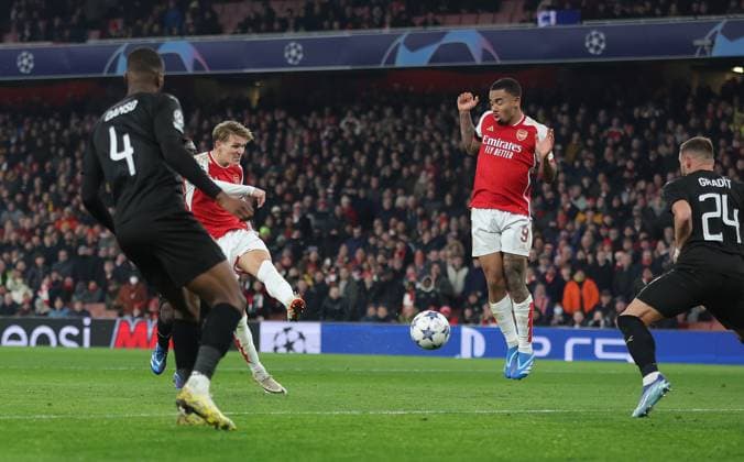 London, England, 29th November 2023. Martin Odegaard of Arsenal scores to make it 5-0 during the UEFA Champions League match at the Emirates Stadium, London. Picture credit should read: Paul Terry Sportimage EDITORIAL USE ONLY. No use with unauthorised audio, video, data, fixture lists, club league logos or live services. Online in-match use limited to 120 images, no video emulation. No use in betting, games or single club league player publications. SPI-2761-0023