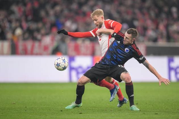 Soccer, UEFA Champions League, 20231129, FC Bayern Munich FC Copenhagen In the picture Konrad LAIMER FC Bayern Munich, 27 and Lukas LERAGER FC Copenhagen, 12 duel ball Munich Allianz Arena Bayern Germany Copyright: Passion2Press MarkusxFischerx