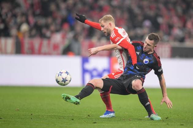 Soccer, UEFA Champions League, 20231129, FC Bayern Munich FC Copenhagen In the picture Konrad LAIMER FC Bayern Munich, 27 and Lukas LERAGER FC Copenhagen, 12 duel ball Munich Allianz Arena Bayern Germany Copyright: Passion2Press MarkusxFischerx