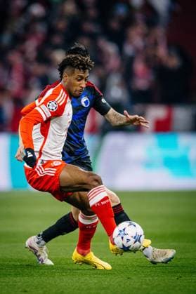 Munich , UEFA Champions League 2023 24 , FC Bayern Munich vs FC Copenhagen In the picture Kingsley Coman FC Bayern Munich vs Kevin Diks FC Copenhagen