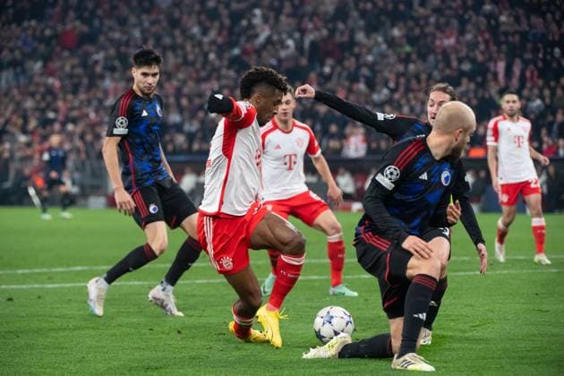 Kingsley Coman FC Bayern Muenchen, 11 in duel with Nicolai Boilesen FC Copenhagen, 20 , GER, FC Bayern Muenchen FCB vs FC Copenhagen FCK , Football, UEFA Champions League, Matchday 5, Group A, Season 2023 2024, 29 11 2023 DFB DFL regulations prohibit any use of photographs as image sequences and or quasi video GER, FC Bayern Muenchen FCB vs FC Copenhagen FCK , Football, UEFA Champions League, Matchday 5, Group A, Season 2023 2024, 29 11 2023 Muenchen Copyright: xEibner-Pressefoto Memmlerx EP_MMR
