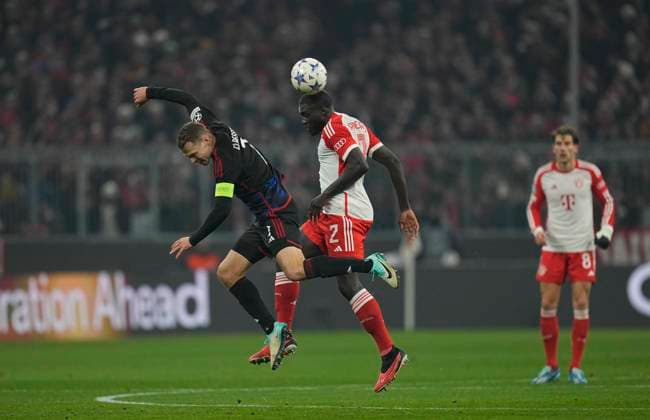 November 29 2023: Dayot Upamecano (FC Bayern MoÂ¼nchen) and Viktor Claesson (FC Copenhagen) battle for the ball during a Champions League - Group A game, Bayern Munich versus FC Copenhagen, at Allianz Arena, Munich, Germany. CSM Munich Germany - ZUMAc04_ 20231129_zma_c04_021 Copyright: xUlrikxPedersenx