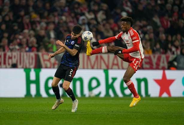 November 29 2023: Kingsley Coman (FC Bayern MoÂ¼nchen) and Kevin Diks (FC Copenhagen) battle for the ball during a Champions League - Group A game, Bayern Munich versus FC Copenhagen, at Allianz Arena, Munich, Germany. CSM Munich Germany - ZUMAc04_ 20231129_zma_c04_033 Copyright: xUlrikxPedersenx
