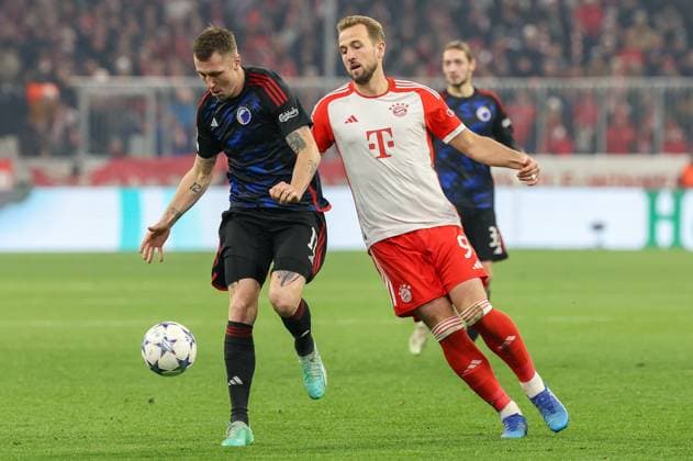in duel, action, with Lukas Lerager 12 FC Copenhagen , Harry Kane 9 FC Bayern Muenchen , FC Bayern Muenchen vs FC Copenhagen, Champions League, football, preliminary round, second leg, 29 11 2023 Muenchen Bayern Germany Copyright: xkolbert-press ChristianxKolbertx