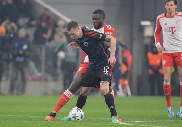 29 11 2023, xemx, Football UEFA Champions League, FC Bayern Muenchen FC Copenhagen emspor, v l Dayot Upamecano FC Bayern Muenchen , Lukas Lerager FC Copenhagen Zweikampf, Aktion, action, battle for the ball DFL DFB REGULATIONS PROHIBIT ANY USE OF PHOTOGRAPHS as IMAGE SEQUENCES and or QUASI VIDEO Muenchen