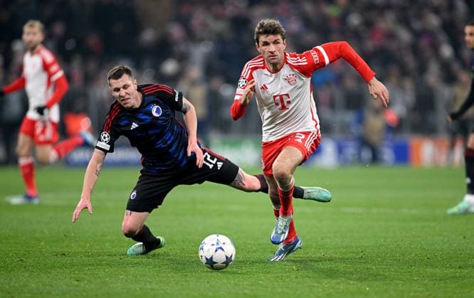 FOOTBALL CHAMPIONS LEAGUE SEASON 2023 2024 Preliminary Round Group A 5 Matchday FC Bayern Muenchen FC Copenhagen 29 11 2023 Lukas Lerager left, FC Copenhagen v Thomas Mueller right, FC Bayern Muenchen