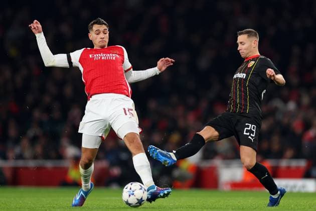 29th November 2023; Emirates Stadium, London, England; Champions League Football, Group Stage, Arsenal versus Lens; Jakub Kiwior of Arsenal competes for the ball with Przemyslaw Frankowski of Lens  ActionPlus12581232 ShaunxBrooks