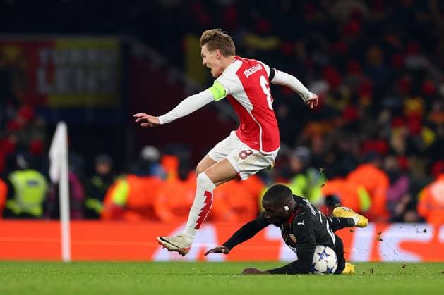 29th November 2023; Emirates Stadium, London, England; Champions League Football, Group Stage, Arsenal versus Lens; Massadio Ha& xef;dara of Lens fouls Martin Odegaard of Arsenal in the act of shooting  ActionPlus12581337 ShaunxBrooks