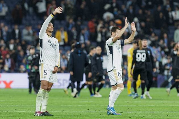 November 30, 2023, Madrid, Spain: Jude Bellingham (L) of Real Madrid celebrates their victory with a teammate after the UEFA Champions League 2023 24 match between Real Madrid and Napoli at Santiago Bernabeu Stadium. Final score; Real Madrid 4:2 Napoli. Madrid Spain - ZUMAs197 20231130_aaa_s197_001 Copyright: xGuillermoxMartinezx