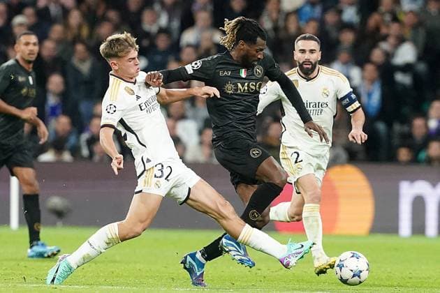 Champions League - Real Madrid v Napoli Real Madrid CF s Nicolas Paz (l) and Dani Carvajal (r) and SSC Napoli s Andre-Frank Zambo Anguissa during Champions League 2023 2024, Group C match Real Madrid v Napoli on November 29, 2023 in Madrid, Spain. Photo by Acero AlterPhotos ABACAPRESS.COM Madrid Spain  Copyright: xAcero AlterPhotos ABACAx