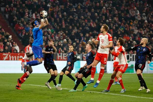 (231130) -- MUNICH, Nov. 30, 2023 -- Kamil Grabara (2nd L), goalkeeper of Copenhagen, saves the ball during the UEFA Champions League Group A football match between Bayern Munich and Copenhagen in Munich, Germany, Nov. 29, 2023. (Photo by Philippe Ruiz Xinhua) (SP)GERMANY-MUNICH-FOOTBALL-UEFA CHAMPIONS LEAGUE-BAYERN MUNICH VS COPENHAGEN FeixLipu¡¤luyizi 