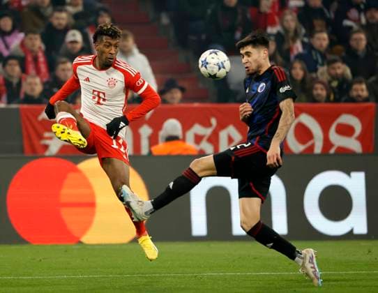 (231130) -- MUNICH, Nov. 30, 2023 -- Kingsley Coman (L) of Bayern Munich vies with Kevin Diks of Copenhagen during the UEFA Champions League Group A football match between Bayern Munich and Copenhagen in Munich, Germany, Nov. 29, 2023. (Photo by Philippe Ruiz Xinhua) (SP)GERMANY-MUNICH-FOOTBALL-UEFA CHAMPIONS LEAGUE-BAYERN MUNICH VS COPENHAGEN FeixLipu¡¤luyizi 
