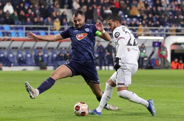(231201) -- BACKA TOPOLA, Dec. 1, 2023 -- West Ham s Said Benrahma (R) vies with TSC s Goran Antonic during UEFA Europa League group A match between TSC Backa Topola and West Ham in Backa Topola, Serbia on Nov. 30, 2023. (Photo by Xinhua) (SP)SERBIA-BACKA TOPOLA-UEFA EUROPA LEAGUE-TSC VS WEST HAM PredragxMilosavljevic 