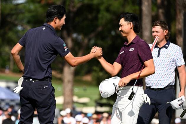 GOLF AUSTRALIAN OPEN, Min Woo Lee of Australia (centre) shakes hands with Rikuya Hoshino of Japan after finishing their round during Round 2 of the Australian Open 2023 at the Australian Golf Club in Sydney, Friday, December 1, 2023. ( NO ARCHIVING, EDITORIAL USE ONLY, NO USE IN BOOKS WITHOUT CONSENT SYDNEY NEW SOUTH WALES AUSTRALIA  Copyright: xDANxHIMBRECHTSx 20231201001872264523