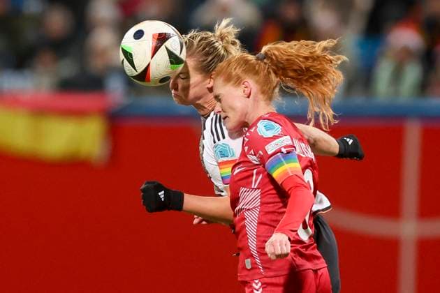 Germany, Rostock, 01 12 2023, Ostseestadion, Germany vs Denmark UEFA Womens Nations League Group A3, Alexandra Popp Germany and Stine Ballisager Denmark battle for the ball Rostock Ostseestadion Germany  eu-images-700