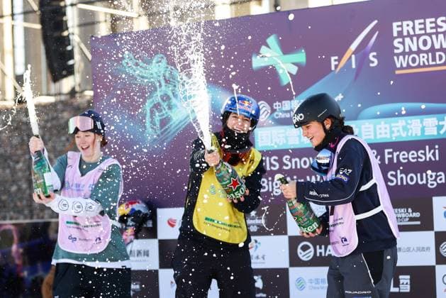 BEIJING, CHINA - DECEMBER 02: (L - R) Second place winner Kirsty Muir of Great Britain, first place winner Mathilde Gremaud of Switzerland and third place winner Flora Tabanelli of Italy celebrate on the podium after the Women s Freeski Big Air Final at the Big Air Shougang on December 2, 2023 in Beijing, China.  Copyright: xVCGx 111467425892