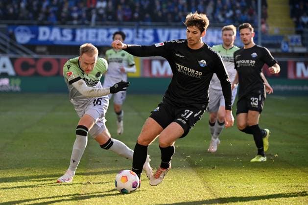 Paderborn, Home Deluxe Arena, 03 12 23, GER, Herren, 2 Bundesliga, Saison 2023 2024, SC Paderborn 07 Hannover 96 Bild v li im Zweikampf Havard NIELSEN Hannover und Maximilian ROHR Paderborn Only for editorial use DFL regulations prohibit any use of photographs as image sequences and or quasi video NRW Deutschland