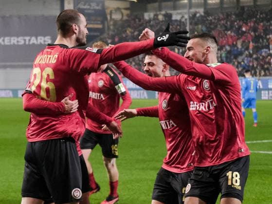 SV Wehen Wiesbaden is happy about the goal for 1 0, GER, SV Wehen Wiesbaden vs Eintracht Braunschweig, Football, 2 Bundesliga, Matchday 16, Season 2023 2024, 08 12 2023 DFL REGULATES PROHIBIT ANY USE OF PHOTOGRAPHS AS IMAGE SEQUENCES AND OR QUASI VIDEO GER, SV Wehen Wiesbaden vs Eintracht Braunschweig, Football, 2 Bundesliga, Matchday 16, Season 2023 2024, 08 12 2023 Wiesbaden Copyright: xEibner-Pressefoto FlorianxWieganx EP_FWD