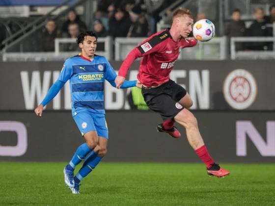 Johan Gomez Eintracht Braunschweig, 44 , Bjarke Jacobsen SV Wehen Wiesbaden, 19 , GER, SV Wehen Wiesbaden vs Eintracht Braunschweig, Football, 2 Bundesliga, Matchday 16, Season 2023 2024, 08 12 2023 DFL REGULATES PROHIBIT ANY USE OF PHOTOGRAPHS AS IMAGE SEQUENCES AND OR QUASI VIDEO GER, SV Wehen Wiesbaden vs Eintracht Braunschweig, Football, Bundesliga 2, Matchday 16, Season 2023 2024, 08 12 2023 Wiesbaden Copyright: xEibner-Pressefoto FlorianxWieganx EP_FWD