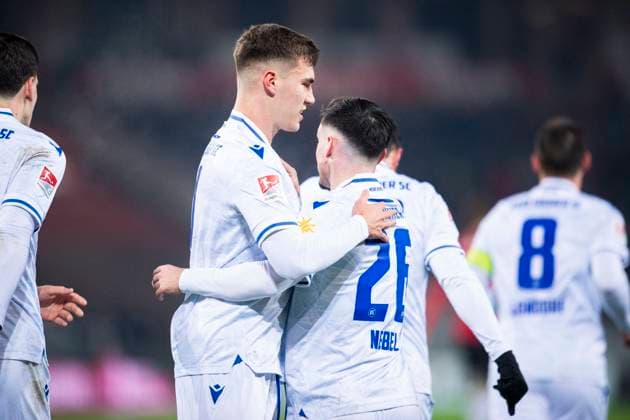 08 12 2023 Soccer, 2023 2024, 2 Bundesliga, Matchday 16, Hannover 96 Karlsruher SC L R Marcel Beifus Karlsruhe , Paul Nebel Karlsruhe cheer after the goal to 0 1 DFL REGULATIONS PROHIBIT ANY USE OF PHOTOGRAPHS AS IMAGE SEQUENCES AND OR QUASI VIDEO Hannover Lower Saxony Germany Heinz von Heiden Arena