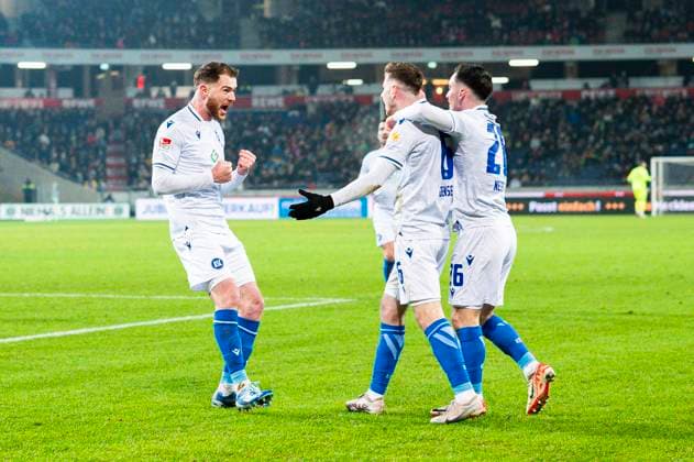 08 12 2023 Soccer, 2023 2024, 2 Bundesliga, Matchday 16, Hannover 96 Karlsruher SC L R Budu Zivzivadze Karlsruhe , Leon Jensen Karlsruhe , Paul Nebel Karlsruhe cheer after the goal to 0 1 DFL REGULATIONS PROHIBIT ANY USE OF PHOTOGRAPHS AS IMAGE SEQUENCES AND OR QUASI VIDEO Hannover Lower Saxony Germany Heinz von Heiden Arena