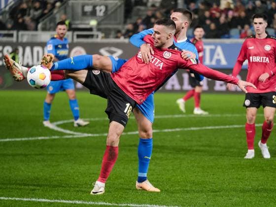 Hasan Kurucay Eintracht Braunschweig, 29 in duel with Ivan Prtajin SV Wehen Wiesbaden, 18 , GER, SV Wehen Wiesbaden vs Eintracht Braunschweig, Soccer, 2 Bundesliga, Matchday 16, Season 2023 2024, 08 12 2023 DFL REGULATES PROHIBIT ANY USE OF PHOTOGRAPHS AS IMAGE SEQUENCES AND OR QUASI VIDEO GER, SV Wehen Wiesbaden vs Eintracht Braunschweig, Football, 2 Bundesliga, Matchday 16, Season 2023 2024, 08 12 2023 Wiesbaden Copyright: xEibner-Pressefoto FlorianxWieganx EP_FWD