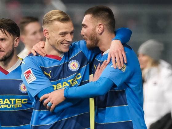Saulo Decarli Eintracht Braunschweig, 03 and Hasan Kurucay Eintracht Braunschweig, 29 are happy about victory, GER, SV Wehen Wiesbaden vs Eintracht Braunschweig, Football, 2 Bundesliga, Matchday 16, Season 2023 2024, 08 12 2023 DFL REGULATES PROHIBIT ANY USE OF PHOTOGRAPHS AS IMAGE SEQUENCES AND OR QUASI VIDEO GER, SV Wehen Wiesbaden vs Eintracht Braunschweig, Football, 2 Bundesliga, Matchday 16, Season 2023 2024, 08 12 2023 Wiesbaden Copyright: xEibner-Pressefoto FlorianxWieganx EP_FWD