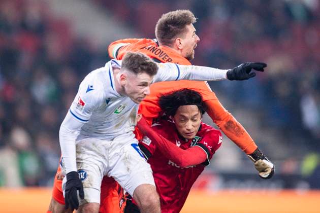 08 12 2023 Soccer, 2023 2024, 2 Bundesliga, Matchday 16, Hannover 96 Karlsruher SC L R Leon Jensen Karlsruhe , Ron Robert Zieler Hannover , Sei Muroya Hannover DFL REGULATIONS PROHIBIT ANY USE OF PHOTOGRAPHS AS IMAGE SEQUENCES AND OR QUASI VIDEO Hannover Lower Saxony Germany Heinz von Heiden Arena
