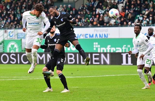 09 12 2023 Soccer season 2023 2024 2 Soccer Bundesliga 16 Matchday SpVgg Greuther Fürth Kleeblatt 1 FC Magdeburg FCM Sportfoto Zink xwoxzix DFL regulations prohibit any use of photographs as image sequences and or quasi video only for editorial use Armindo Sieb 30, SpVgg Greuther Fürth in header duel with Jamie Lawrence 5, FC Magdeburg