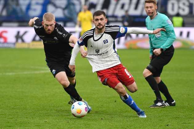 GER 2 FBL,, Hamburger SV vs SC Paderborn 07 09 12 2023, Volksparkstadion, Hamburg, GER 2 FBL, Hamburger SV vs SC Paderborn 07 in the picture Kai Klefisch Paderborn 27 tries to assert himself against Lukasz Poreba Hamburg 06 nordphotoxGmbH xWitke nph00002