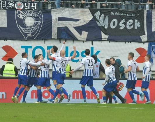 Soccer 2 Bundesliga Season 2023 24 Kaiserslautern Fritz Walter Stadion 09 12 2023 1 FC Kaiserslautern fck Hertha BSC Berlin b 1 2 Berliners cheer after the winning goal Soccer 2 Bundesliga 1 FC Kaiserslautern