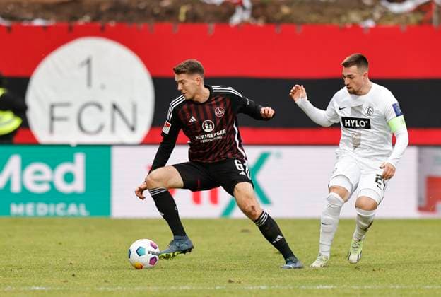10 12 2023 Soccer Season 2023 2024 2 Soccer Bundesliga 16 Matchday SV Elversberg 1 FC Nürnberg FCN Club Sportfoto Zink DaMa xdaxmax DFL regulations prohibit any use of photographs as image sequences and or quasi video only for editorial use Florian Flick 6, 1 FC Nürnberg FCN Luca Schnellbacher 24, SV Elversberg
