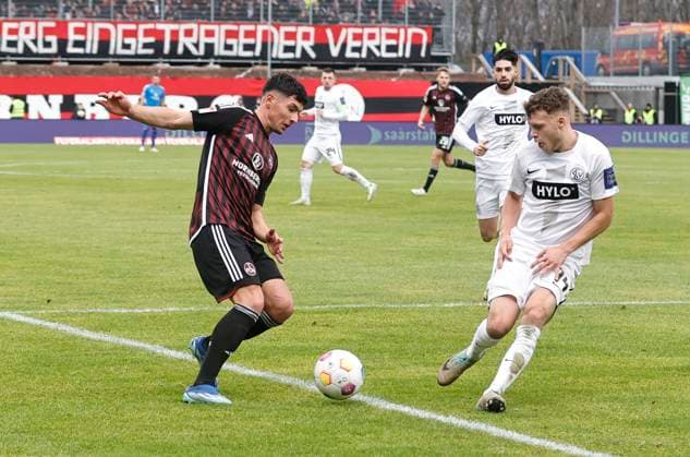 10 12 2023 Soccer season 2023 2024 2 Soccer Bundesliga 16 Matchday SV Elversberg 1 FC Nürnberg FCN Club Sportfoto Zink DaMa xdaxmax DFL regulations prohibit any use of photographs as image sequences and or quasi video only for editorial use Taylan Duman 8, 1 FC Nürnberg FCN Robin Fellhauer 14, SV Elversberg