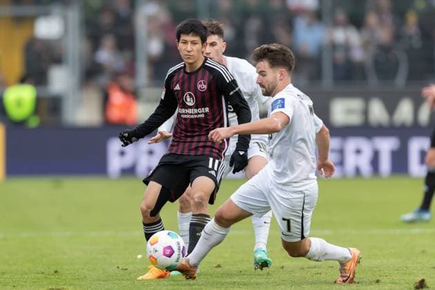 Germany, Spiesen Elversberg, 10 12 2023, Waldstadion Kaiserlinde, SV Elversberg vs FC Nürnberg 2 Bundesliga, Matchday 16, Kanji Okunuki 1 FC Nuernberg and Manuel Feil SV 07 Elversberg battle for the ball Spiesen Elversberg URSAPHARM Arena an der Kaiserlinde Saarland Germany eu-images-542