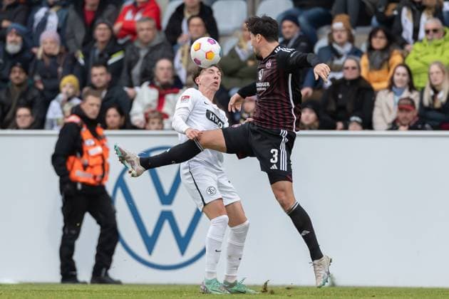Germany, Spiesen Elversberg, 10 12 2023, Waldstadion Kaiserlinde, SV Elversberg vs FC Nürnberg 2 Bundesliga, Matchday 16, Jannik Rochelt SV 07 Elversberg and Ahmet Guerleyen 1 FC Nuernberg battle for the ball Spiesen Elversberg URSAPHARM Arena an der Kaiserlinde Saarland Germany eu-images-542
