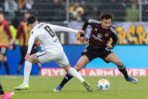 Germany, Spiesen Elversberg, 10 12 2023, Waldstadion Kaiserlinde, SV Elversberg vs FC Nürnberg 2 Bundesliga, 16 Matchday, Semih Sahin SV 07 Elversberg and Jens Castrop 1 FC Nuernberg battle for the ball Spiesen Elversberg URSAPHARM Arena an der Kaiserlinde Saarland Germany eu-images-542