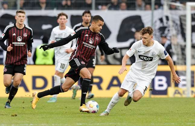 10 12 2023 Soccer season 2023 2024 2 Soccer Bundesliga 16 Matchday SV Elversberg 1 FC Nürnberg FCN Club Sportfoto Zink DaMa xdaxmax DFL regulations prohibit any use of photographs as image sequences and or quasi video only for editorial use Jan Gyamerah 28, 1 FC Nürnberg FCN Robin Fellhauer 14, SV Elversberg