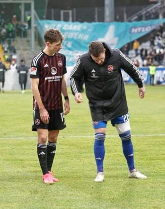 10 12 2023 Soccer season 2023 2024 2 Soccer Bundesliga 16 Matchday SV Elversberg 1 FC Nürnberg FCN Club Sportfoto Zink DaMa xdaxmax DFL regulations prohibit any use of photographs as image sequences and or quasi video only for editorial use Christian Mathenia 26, 1 FC Nürnberg FCN simulates Benjamin Goller 14, 1 FC Nürnberg FCN how he got hurt pain injury injury injury
