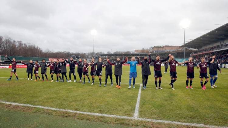 10 12 2023 Soccer Season 2023 2024 2 Soccer Bundesliga 16 Matchday SV Elversberg 1 FC Nürnberg FCN Club Sportfoto Zink DaMa xdaxmax DFL regulations prohibit any use of photographs as image sequences and or quasi video only for editorial use Joy Cheering after the end of the match Team FCN with cheering chain Cheering wave