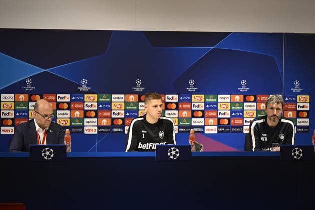 Antwerp s goalkeeper Jean Butez and Antwerp s head coach Mark van Bommel pictured during a press conference, PK, Pressekonferenz of Belgian soccer team Royal Antwerp FC, on Tuesday 12 December 2023 in Antwerp. The team is preparing for tomorrow s game against Spanish club FC Barcelona, Barca on day six of the Champions League group stage, in group H. TOM GOYVAERTS TomxGoyvaerts  x82153808x