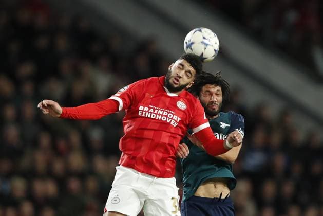 EINDHOVEN - (l-r) Ismael Saibari of PSV Eindhoven, Mohamed Elneny of Arsenal FC during the UEFA Champions League Group B match between PSV Eindhoven and Arsenal FC at Phillips Stadium on December 12, 2023 in Eindhoven, Netherlands. ANP Hollandse Hoogte Bart Stoutjesdijk UEFA Champions League 2023 24 2023 2024 xVIxANPxSportx xBartxStoutjesdijkxIVx 486128193 originalFilename: 486128193.jpg