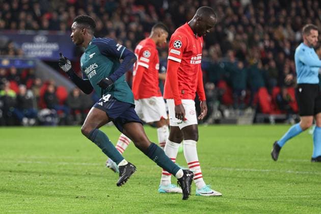 Eddie Nketiah of Arsenal celebrates scoring the 1st goal PSV Eindhoven v Arsenal, UEFA Champions League, Group B, Football, Philips Stadion, Eindhoven, Netherlands - 12 Dec 2023 EDITORIAL USE ONLY No use with unauthorised audio, video, data, fixture lists, club league logos or live services. Online in-match use limited to 120 images, no video emulation. No use in betting, games or single club league player publications. Copyright: xPaulxCurrie Shutterstockx 14254183as