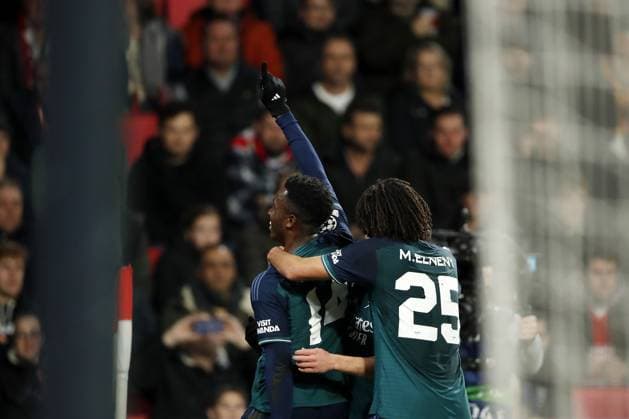 EINDHOVEN - (l-r) Eddie Nketiah of Arsenal FC, Mohamed Elneny of Arsenal FC celebrate the 0-1 draw during the UEFA Champions League Group B match between PSV Eindhoven and Arsenal FC at the Phillips Stadium on December 12, 2023 in Eindhoven, Netherlands. ANP Hollandse Hoogte Bart Stoutjesdijk UEFA Champions League 2023 24 2023 2024 xVIxANPxSportx xBartxStoutjesdijkxIVx 486128658 originalFilename: 486128658.jpg