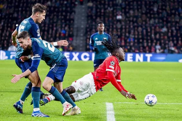 EINDHOVEN, 12-12-2023, Philips Stadium, UEFA Champions League season 2023 24, match between PSV and Arsenal, Arsenal player Jorginho and PSV player Johan Bakayoko PSV - Arsenal  x23496935x Copyright: