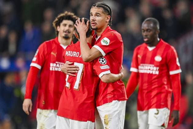 EINDHOVEN, 12-12-2023, Philips Stadion, UEFA Champions League Football, season 2023 2024, Match between PSV and Arsenal. PSV player Armando Obispo and PSV player Mauro Junior after the match, end result 1-1 PSV - Arsenal  x23497183x Copyright: