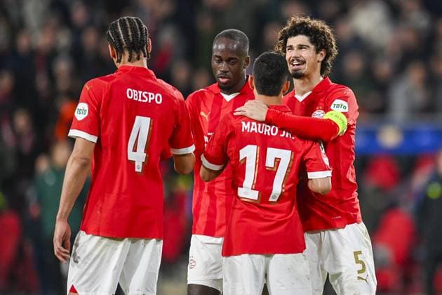 EINDHOVEN, 12-12-2023, Philips Stadion, UEFA Champions League Football, season 2023 2024, Match between PSV and Arsenal. PSV player Armando Obispo and PSV player Mauro Junior after the match, end result 1-1 PSV - Arsenal  x23497184x Copyright: