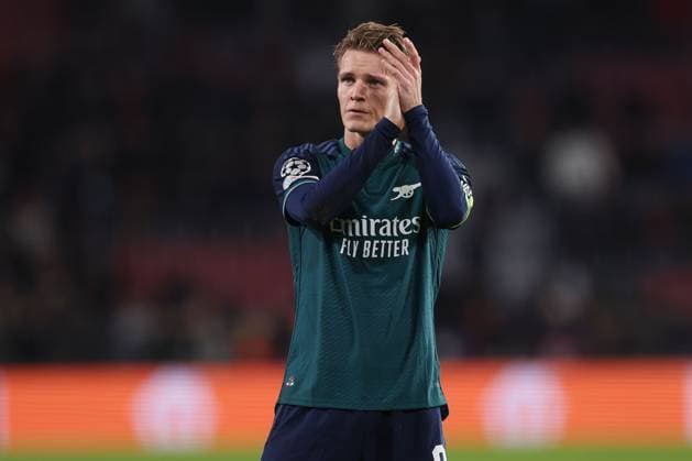 Martin Odegaard of Arsenal at the end of the match PSV Eindhoven v Arsenal, UEFA Champions League, Group B, Football, Philips Stadion, Eindhoven, Netherlands - 12 Dec 2023 EDITORIAL USE ONLY No use with unauthorised audio, video, data, fixture lists, club league logos or live services. Online in-match use limited to 120 images, no video emulation. No use in betting, games or single club league player publications.  Copyright: xPaulxCurrie Shutterstockx 14254183cf