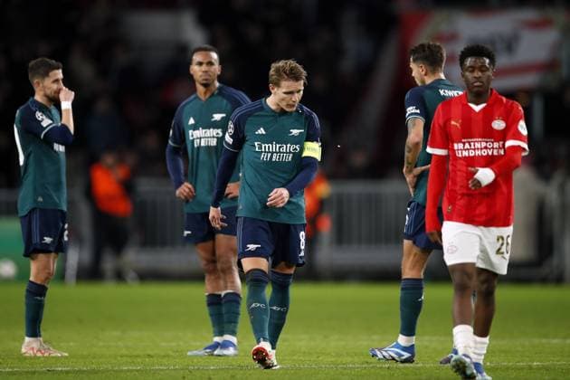 EINDHOVEN - (l-r) Gabriel of Arsenal FC, Martin Odegaard of Arsenal FC during the UEFA Champions League Group B match between PSV Eindhoven and Arsenal FC at the Phillips Stadium on December 12, 2023 in Eindhoven, Netherlands. ANP Hollandse Hoogte Bart Stoutjesdijk UEFA Champions League 2023 24 2023 2024 xVIxANPxSportx xBartxStoutjesdijkxIVx 486133785 originalFilename: 486133785.jpg