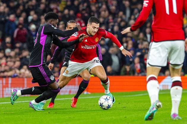 Manchester United, ManU v Bayern Munich Champions League 12 12 2023. Diogo Dalot (20) of Manchester United during the Champions League match between Manchester United and Bayern Munich at Old Trafford, Manchester, England on 12 December 2023. Editorial use only , Copyright: xNigelxKeenex PSI-18580-0017