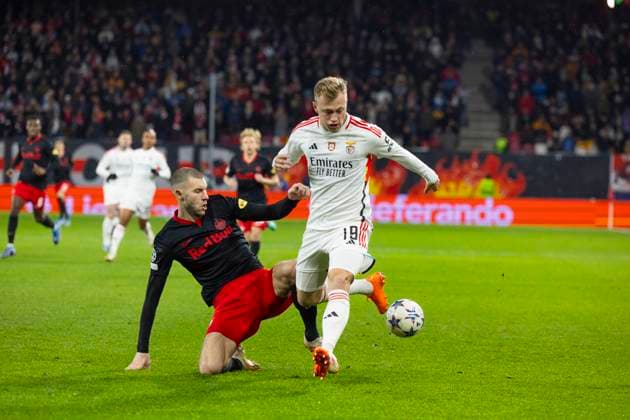 SOCCER - UEFA CL, RBS vs Benfica SALZBURG,AUSTRIA,12.DEC.23 - SOCCER - UEFA Champions League, group stage, Red Bull Salzburg vs SL Benfica. Image shows Strahinja Pavlovic (RBS) and Casper Tengstedt (Benfica).  GEPAxpictures xGintarexKarpaviciute